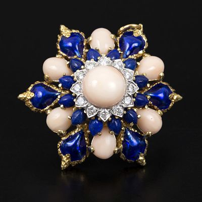 18K gold brooch/pendant adorned with coral, diamonds, pearls, and enamel. A high-quality 