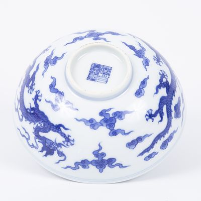 Chinese blue and white porcelain bowl decorated with dragons. A blue and white porcelain bowl 