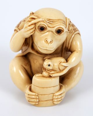 An old monkey-shaped netsuke, Japan. High-quality carved material, full of details. A monkey 