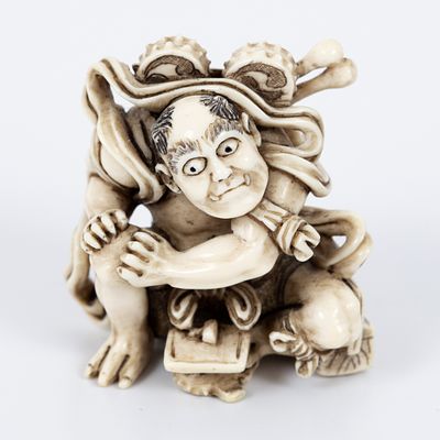 Netsuke is sleeping in the form of NIO, Japan. A great netsuki full of precise details and 