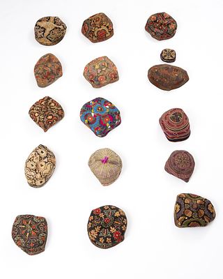 Lot of old Bukhari yarmulkas . An impressive cluster of 16 yarlmukas , decorated with embroidery 