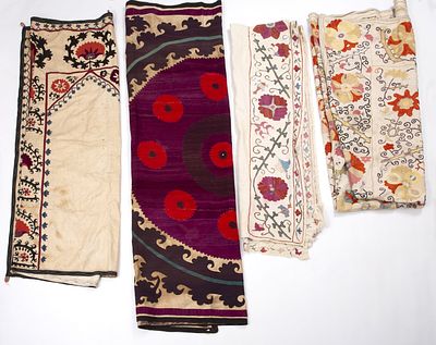 Lot of four old Susani embroideries, Uzbekistan. Traditional Uzbek embroidery with colored 