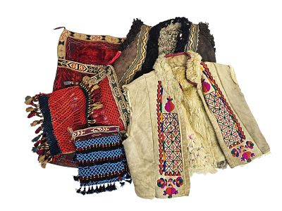 Lot of Uzbek items, fur textile and embroidery, 19th century, early 20th century. Two wool coats 