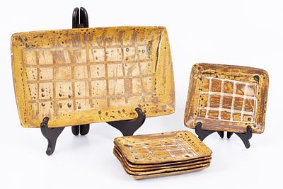 Israeli ceramics, six plates and a central tray designed by Nehemia Azaz. A rectangular 