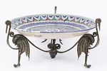 A large painted bowl placed on a metal stand with a bird pattern. A European ceramic bowl Image - 2