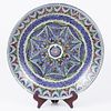 A large painted bowl placed on a metal stand with a bird pattern. A European ceramic bowl Image - 3
