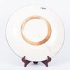 A large painted bowl placed on a metal stand with a bird pattern. A European ceramic bowl Image - 4