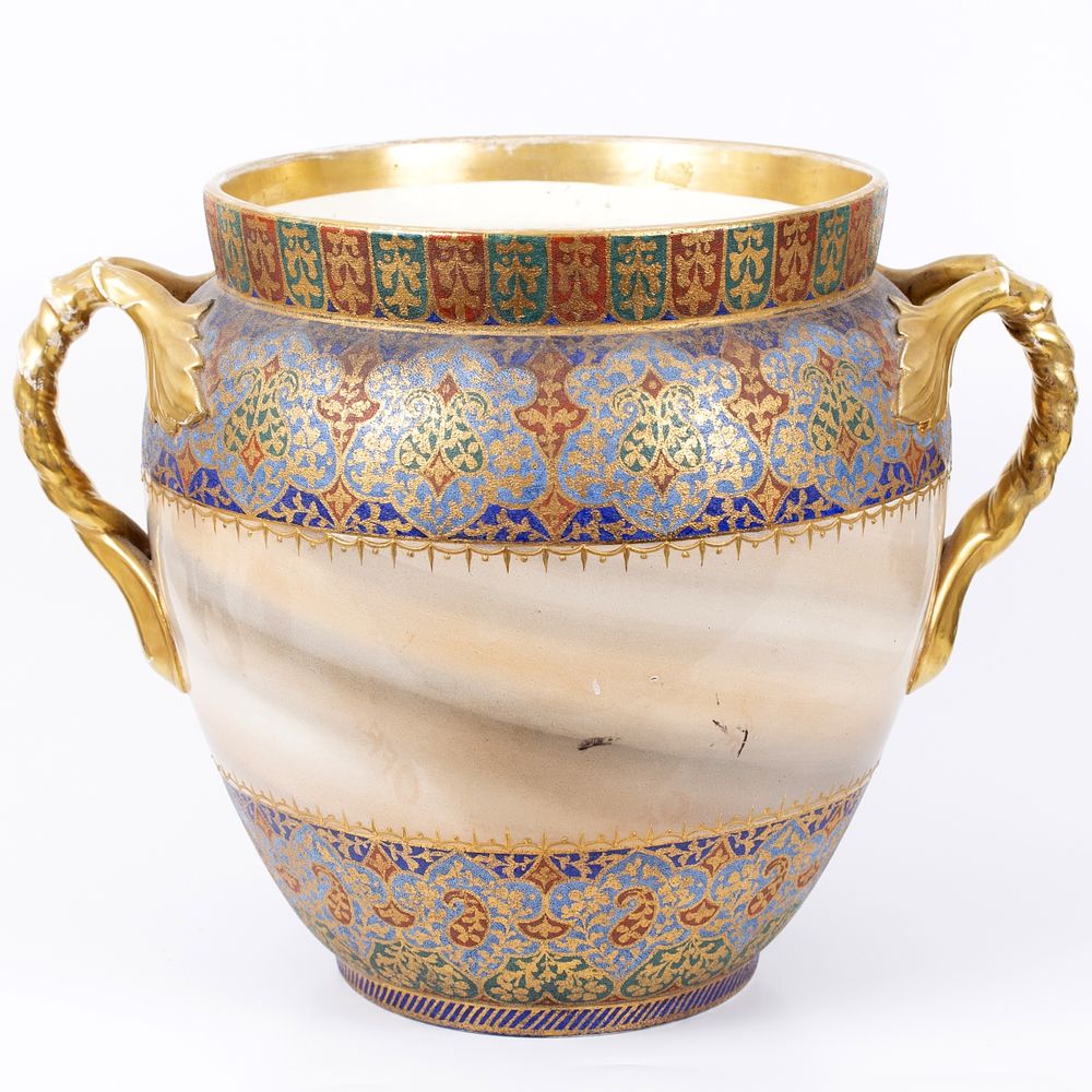 And an oversized ceramic vase made by ANTON MEHLEM decorated with arabesques. A large ceramic 