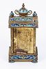 An old Victorian traveling clock decorated with enamel paintings. The movement was changed to a Image - 3