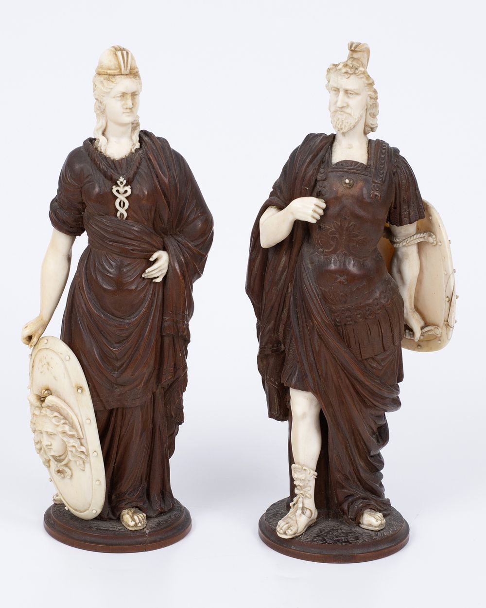 A pair of French neoclassical sculptures made of organic material combined with wood. A pair of 