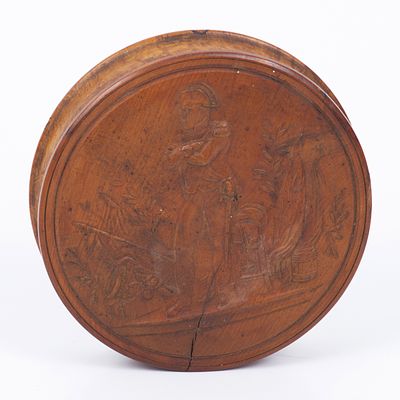 Tobacco box made of burl wood carved with the image of Napoleon, early 19th century Europe. The 