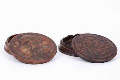Two tobacco boxes carved in wood, 18th century Europe. carved with classical scenes depicting 