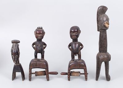 לוט של ראשי נול מגולפים מעץ עם פטינה חומה, אפריקה, מחצית הראשונה של המאה ה־20. כל פריט מגוף 