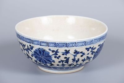 A Blue and White Porcelain Bowl, China. Decorated with flowers between upper and lower borders 