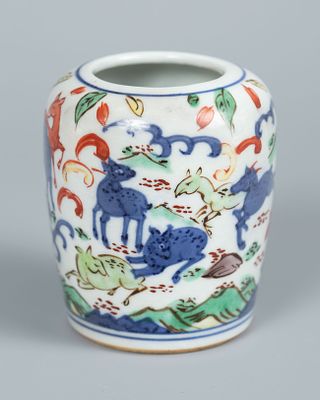 A Polychrome Porcelain Vase, China, Qing Dynasty (1644–1912). Hand-painted porcelain in 