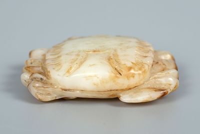 A Carved Russet Jade Figurine of a Crab, China, Qing Dynasty (1644–1912). With finely incised 
