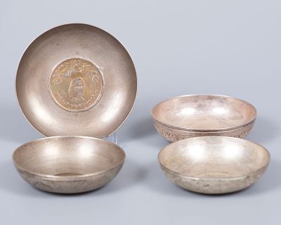 A Set of Four Silver Coin Inset Miniature Plates, Persia, Late 19th Early 20th Century. Each 