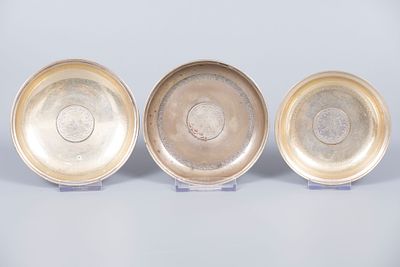 Three Ottoman Parcel Gilt Silver Plates, Late 19th Early 20th Century. Each centered with an 