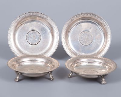 A Set of Four Ottoman Silver Plates, Late 19th Early 20th Century. Each with rim engraved with a 