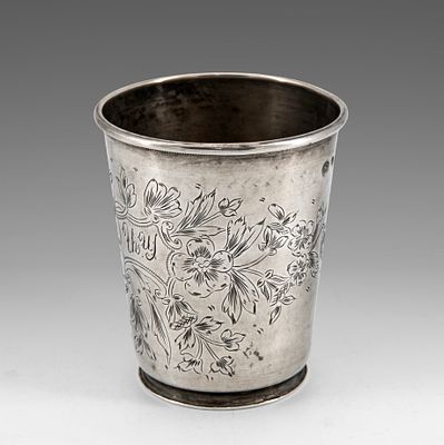 A Silver Beaker, Ottoman Empire, 19th Century. The sides engraved with flowers and scrolling 