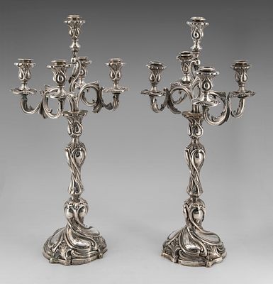 A Pair of Silver Five-Light Candelabra, Germany, Late 19th Century. Hammered and embossed in 