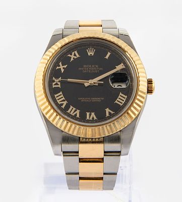 A Rolex Oyster Perpetual Date Just 18K Gold and Stainless Steel Men's Wristwatch. Movement: 