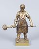 A Pair of Gilt Bronze Blacksmith Figurines. Heights: 30 cm / 20 cm. 
Condition: For a full Image - 1