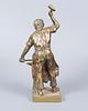 A Pair of Gilt Bronze Blacksmith Figurines. Heights: 30 cm / 20 cm. 
Condition: For a full Image - 8