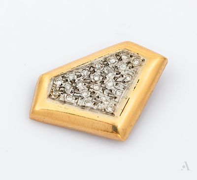 A 14K Two Toned Gold Diamond Pendant. A yellow gold diamond shape centered by an inner frame of 