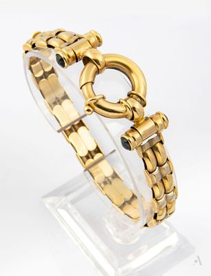 A Retro 14K Two-Tone Gold Bracelet. Designed as alternating double links of yellow and white 