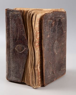 A Handwritten Qur'an, 18th/19th Century. Written in black and red ink on paper, apparently 