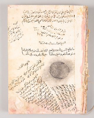 An Islamic Manuscript, 17th Century. Written in black ink on paper and dated to the Hijri year 