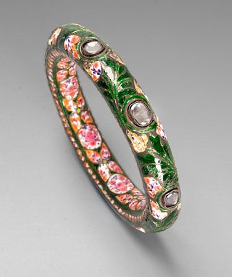 A Mughal-Style Silver Polychrome Enamel and Hardstone Bangle Bracelet. Decorated with polychrome 