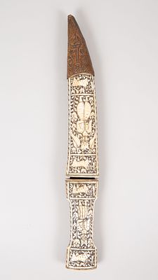 A Carved Organic Material Khanjar Dagger, Persia, Early 20th Century. Hilt and sheath of organic 