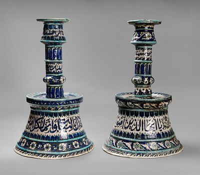 A Pair of Large Iznik-Style Porcelain Candlesticks, Probably Syrian early 20th c. Each decorated 