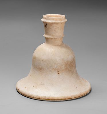 A Carved Marble Hookah Base, India, 18th-19th Century. Of rounded form widening towards the base 