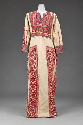 An Embroidered Thobe, Palestine, Early 20th Century. Of light cream fabric, embroidered 
