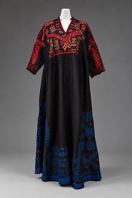 A Satin Embroidered Throbe, Palestine, Early 20th Century. Of black satin, decorated across the 