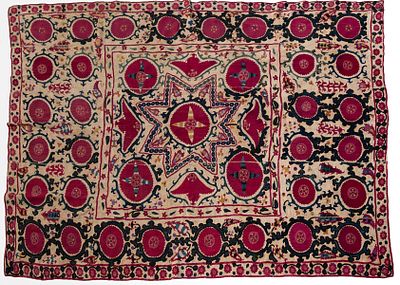 A Fine Suzani Embroidery, Uzbekistan, Late 19th Century. Colorful floral embroidery on a 