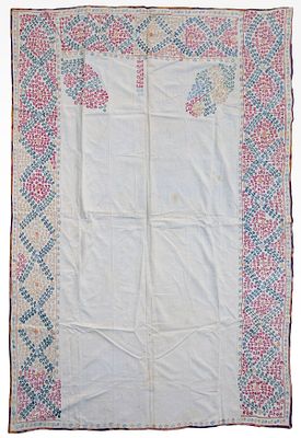 A Suzani Embroidery, Uzbekistan, Late 19th Century. Worked with colorful floral embroidery on a 