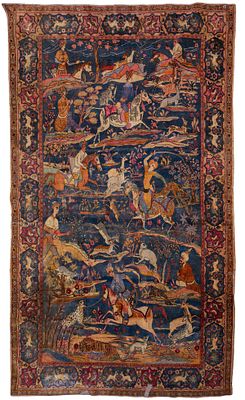 A Fine Rug, Persia, 20th Century. Decorated with a hunting scene on a blue ground. Significant 