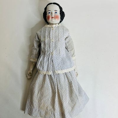 Large China Head doll in Blue Print Dress, approx. 24 inches, damaged and repaired lower legs 