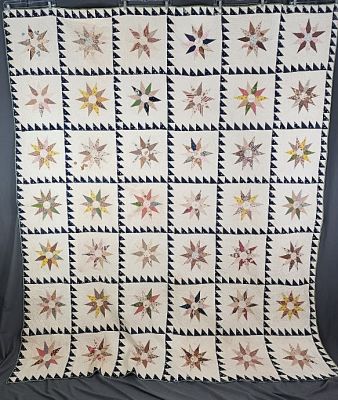 Antique Compass Variation Quilt measuring 89"x107". Quilt found in Missouri. Compass blocks 