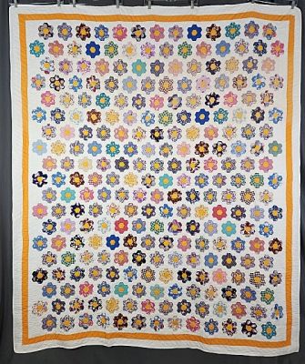 Vintage c1940 Grandmothers Flower Garden Quilt measuring 76"x90". 256 rosettes with solid gold 