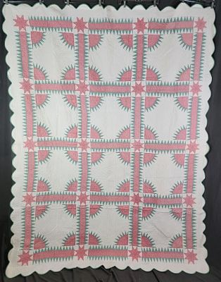 Antique c1920 New York Beauty Quilt measuring 77"x100". This complicated pattern was executed 