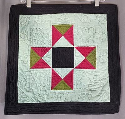 Small Ohio Star Quilt 2008. Small Ohio Star Quilt measuring 18"x18". It is machine pieced and 