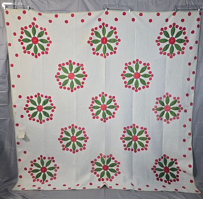 Antique c1850 Red and Green Applique Quilt Measuring 91 by 88 inches. It is comprised of 25 