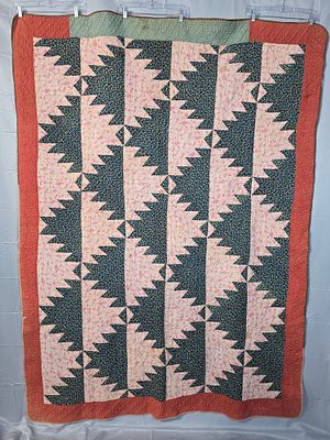 Antique c1860 Delectable Mountains Variation Quilt Measuring 60 by 83 inches. It is comprised 