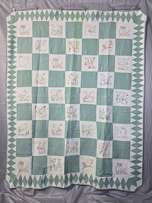 Vintage c1930 Ruby McKim Bird Life/Audubon Quilt measuring 65 by 81 inches. It is comprised of 