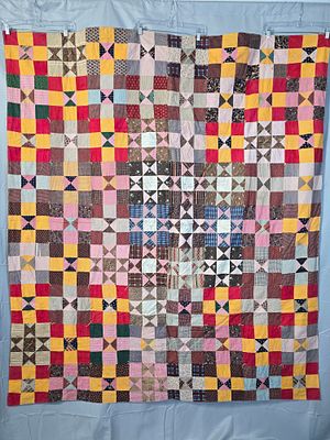 1840-1950ss Massachusetts Tied Comfort Quilt. This multigenerational tied comfort quilt features 